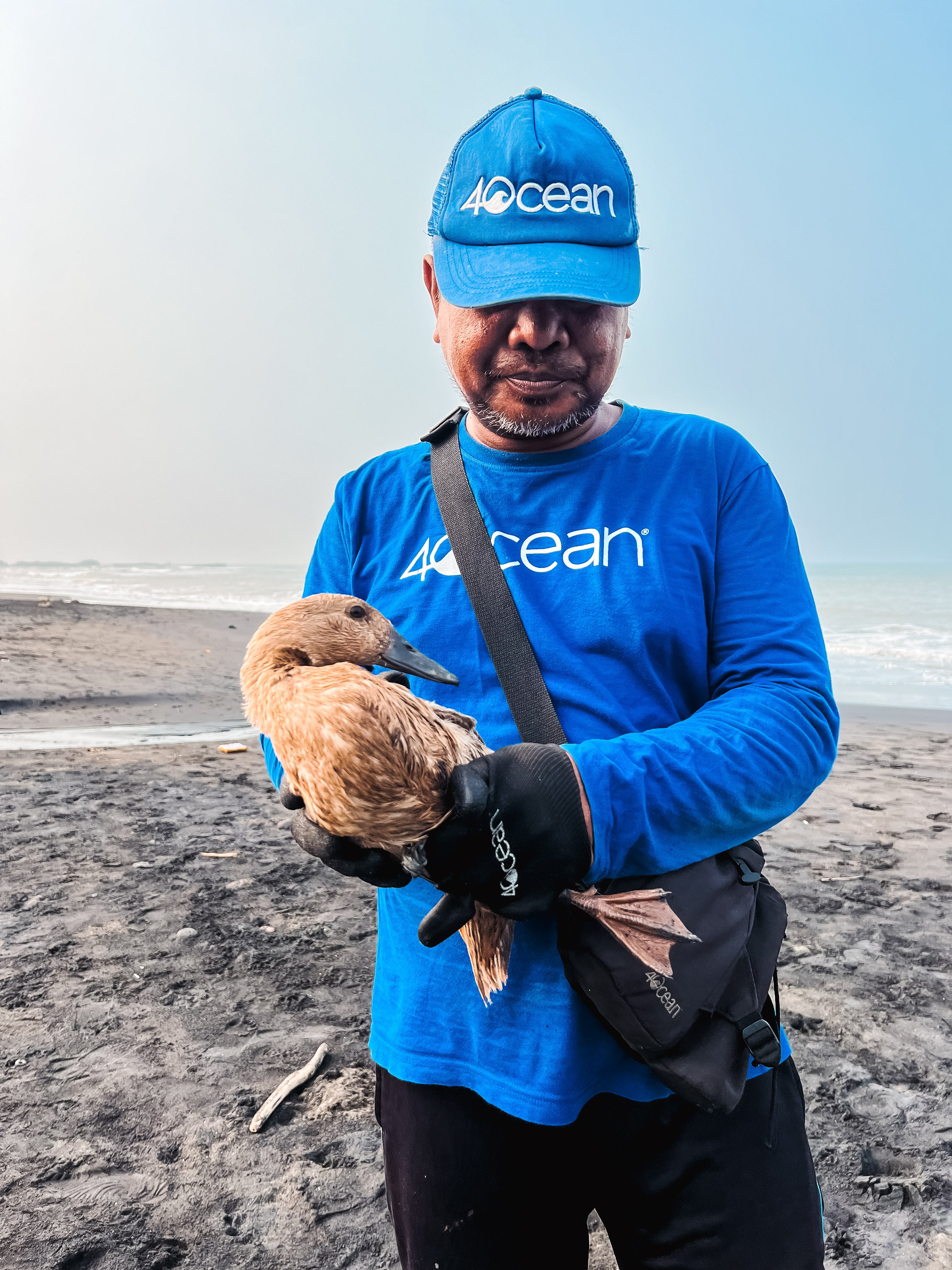 Rescue and Reflection: A Duck, a Ceremony, and the Fight Against Plastic at Nyanyi Beach